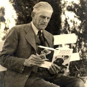 Stijlvolle roze Pedro Dot oorbellen op terracotta achtergrond.