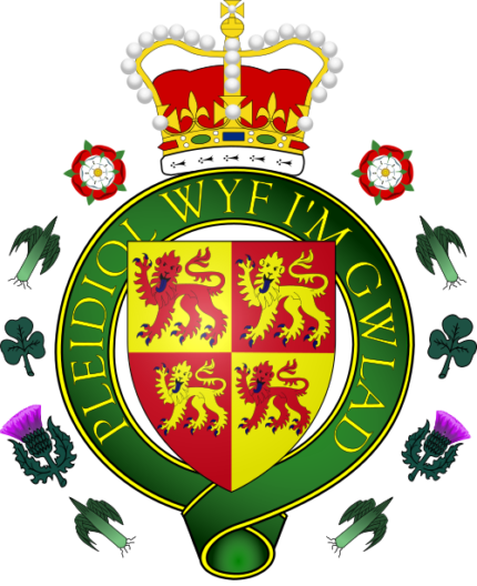 Royal Badge of Wales with red dragon, crown, and green leaves on white background.